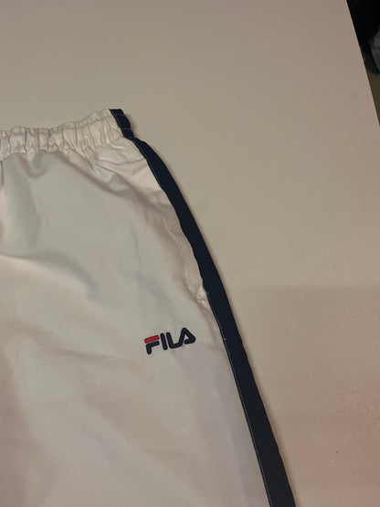 Entdecke unsere Vintage Track Pants von Nike und anderen Marken, erhältlich bei Valuxery.de - Dein Shop für trendige Vintage - Kleidung. Unsere Track Pants sind aus hochwertigen Materialien und