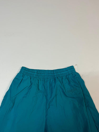 Entdecke unsere Vintage Track Pants von Nike und anderen Marken, erhältlich bei Valuxery.de - Dein Shop für trendige Vintage - Kleidung. Unsere Track Pants sind aus hochwertigen Materialien und