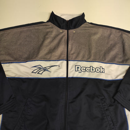 Entdecke unsere Vintage Track Pants von Nike und anderen Marken, erhältlich bei Valuxery.de - Dein Shop für trendige Vintage - Kleidung. Unsere Track Pants sind aus hochwertigen Materialien und