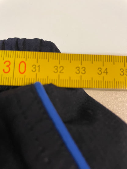 Entdecke unsere Vintage Track Pants von Nike und anderen Marken, erhältlich bei Valuxery.de - Dein Shop für trendige Vintage - Kleidung. Unsere Track Pants sind aus hochwertigen Materialien und