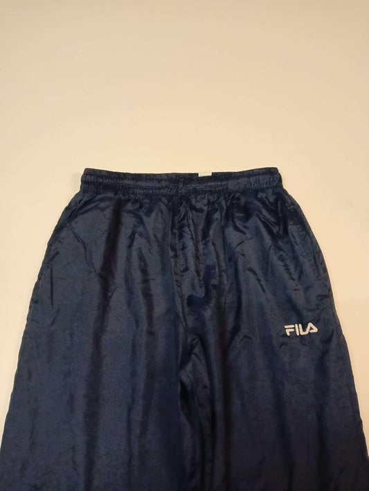 Entdecke unsere Vintage Track Pants von Nike und anderen Marken, erhältlich bei Valuxery.de - Dein Shop für trendige Vintage - Kleidung. Unsere Track Pants sind aus hochwertigen Materialien und