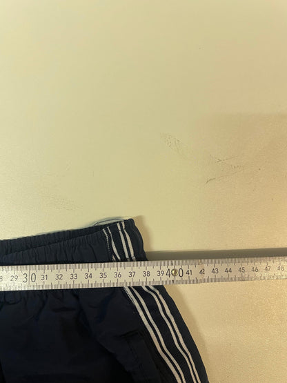 Entdecke unsere Vintage Track Pants von Nike und anderen Marken, erhältlich bei Valuxery.de - Dein Shop für trendige Vintage - Kleidung. Unsere Track Pants sind aus hochwertigen Materialien und